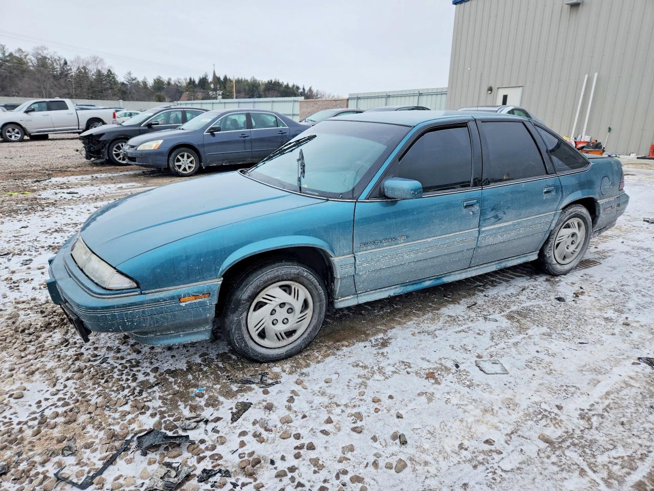 1995 Pontiac Grand Prix SE, VIN 1G2WJ52M5SF231842 — Side