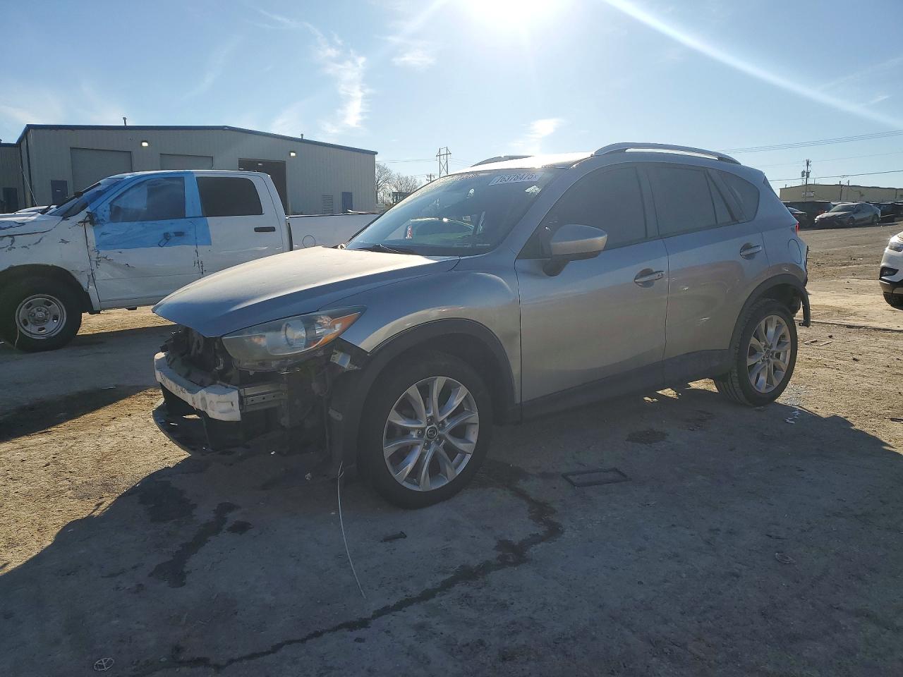 2015 Mazda CX-5 Grand Touring, VIN JM3KE2DY6F0444652 — Rejected repair