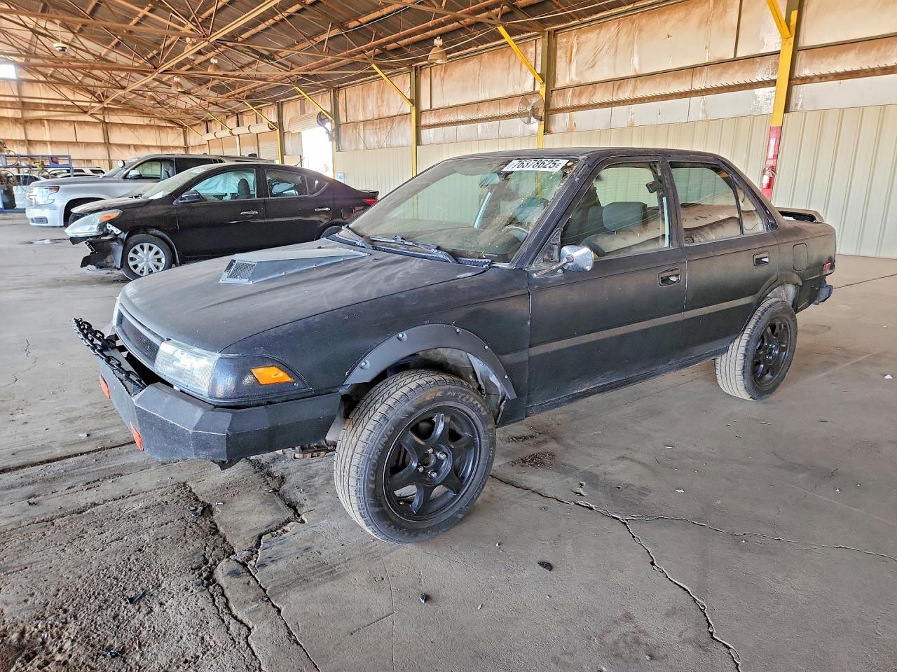 1990 Toyota Corolla, VIN 1NXAE94A4LZ088265 — Rear end