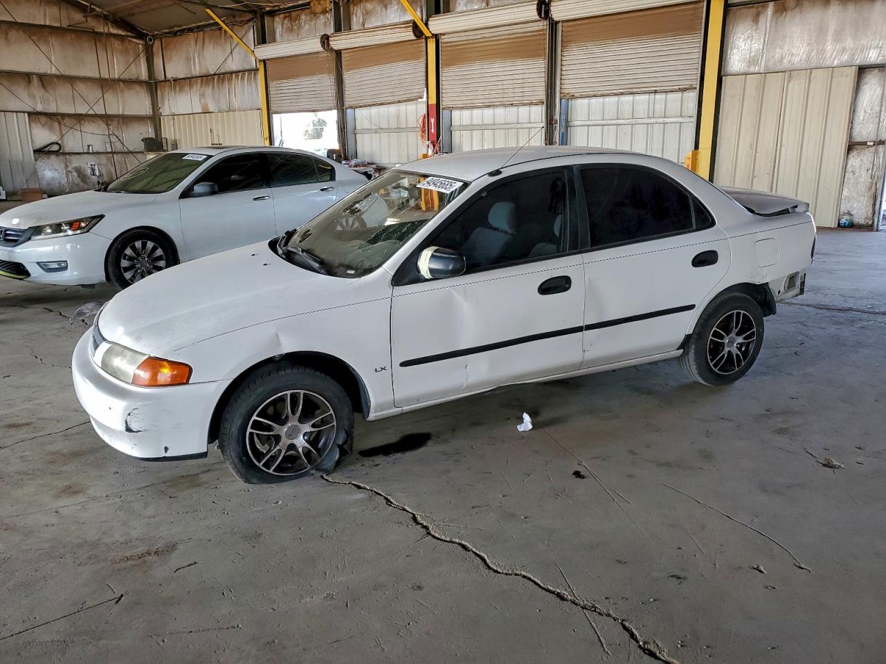 1997 Mazda Protege DX, VIN JM1BC1410V0136757 — По всему кузову