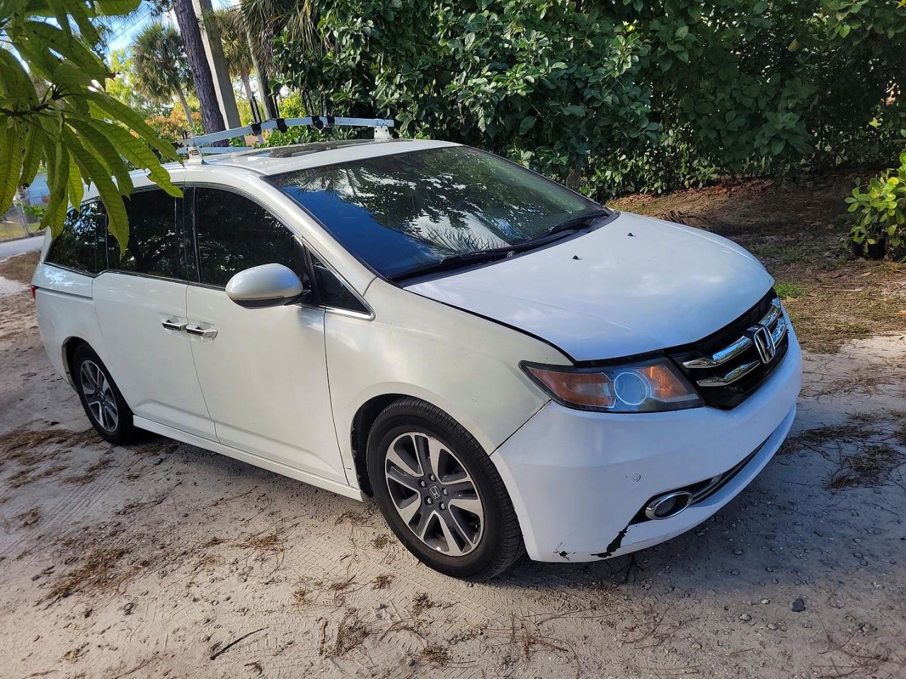 2016 Honda Odyssey Touring Elite, VIN 5FNRL5H95GB073312 — Prior damage history