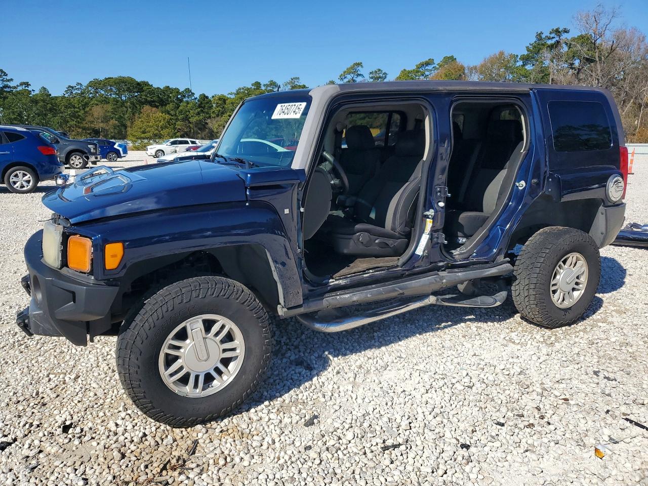 2007 Hummer H3 SUV, VIN 5GTDN13EX78243402 — Бок