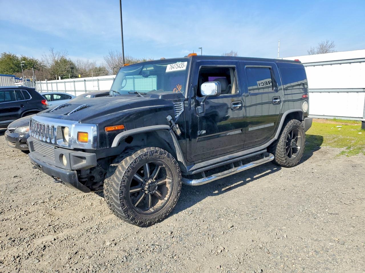 2003 Hummer H2, VIN 5GRGN23U63H130072 — Front end