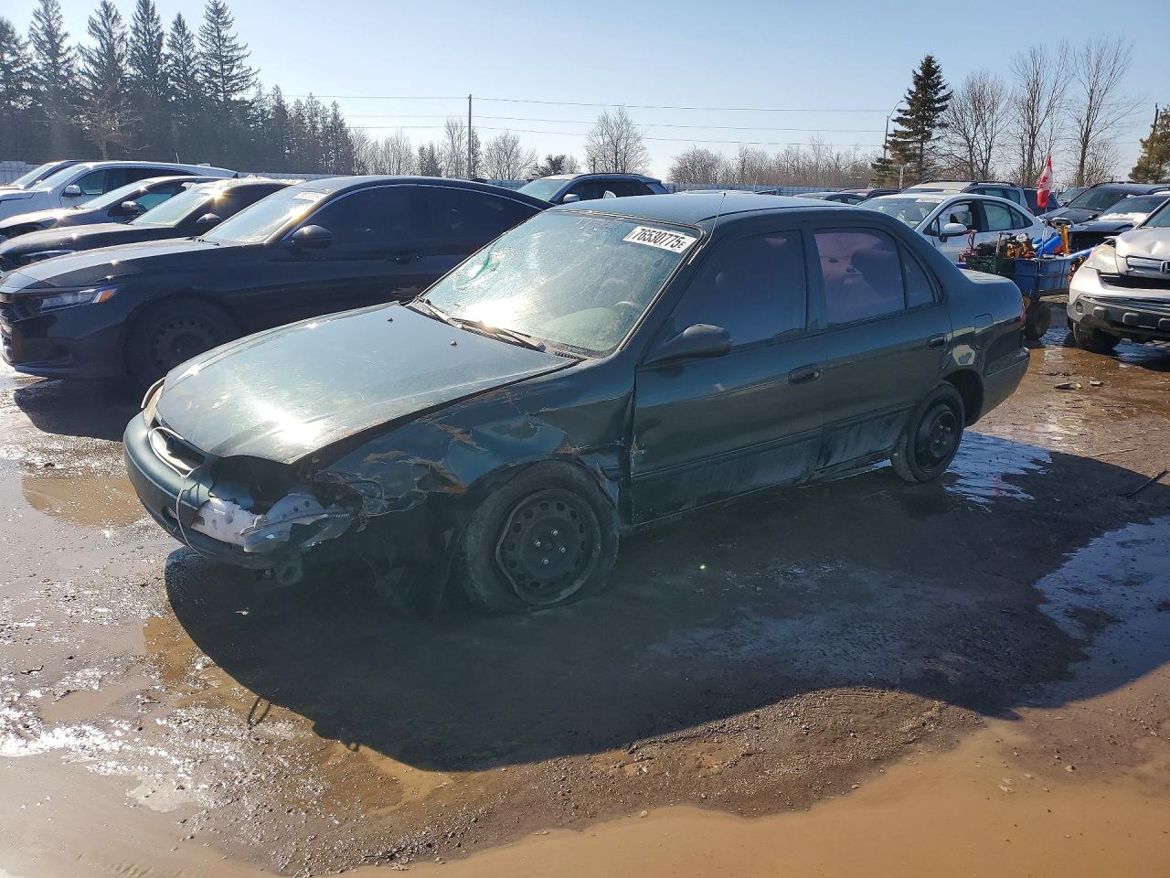 2000 Toyota Corolla CE, VIN 2T1BR12E7YC789214 — Front end