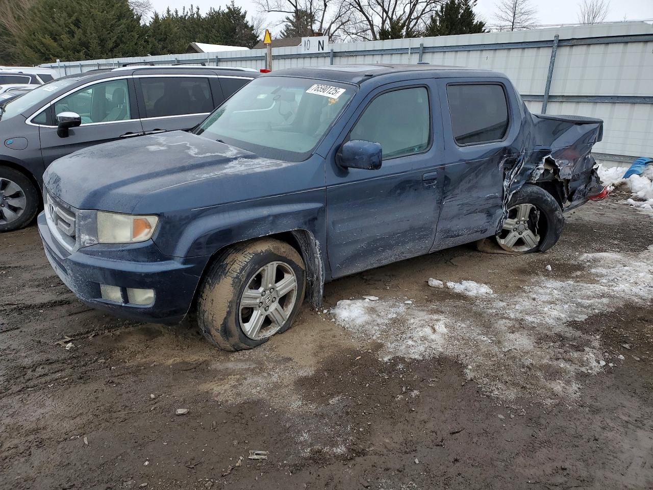 2010 Honda Ridgeline RTL, VIN 5FPYK1F51AB001755 — Side