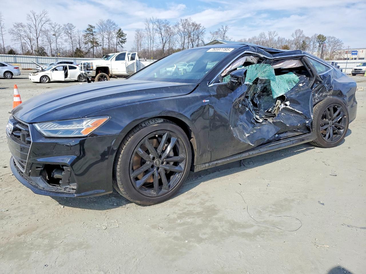 2021 Audi A7 Prestige, VIN WAUV2AF24MN073697 — Side
