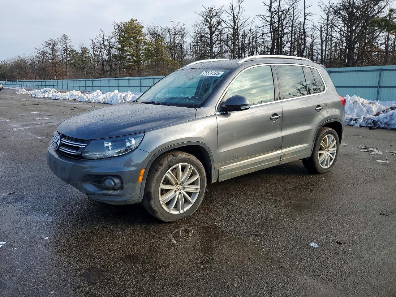 2014 Volkswagen Tiguan S, VIN WVGBV3AX5EW524073 — Undercarriage