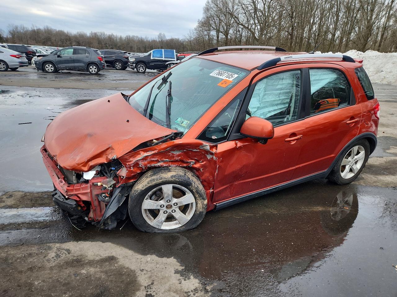 2010 Suzuki SX4 Touring, VIN JS2YB5A75A6310638 — Front end