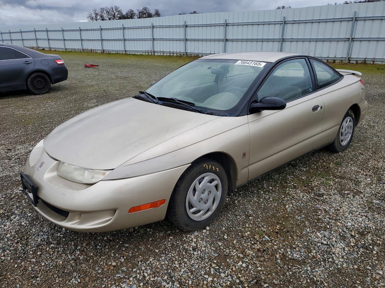 1997 Saturn SC, VIN 1G8ZF1280VZ356203 — Front end