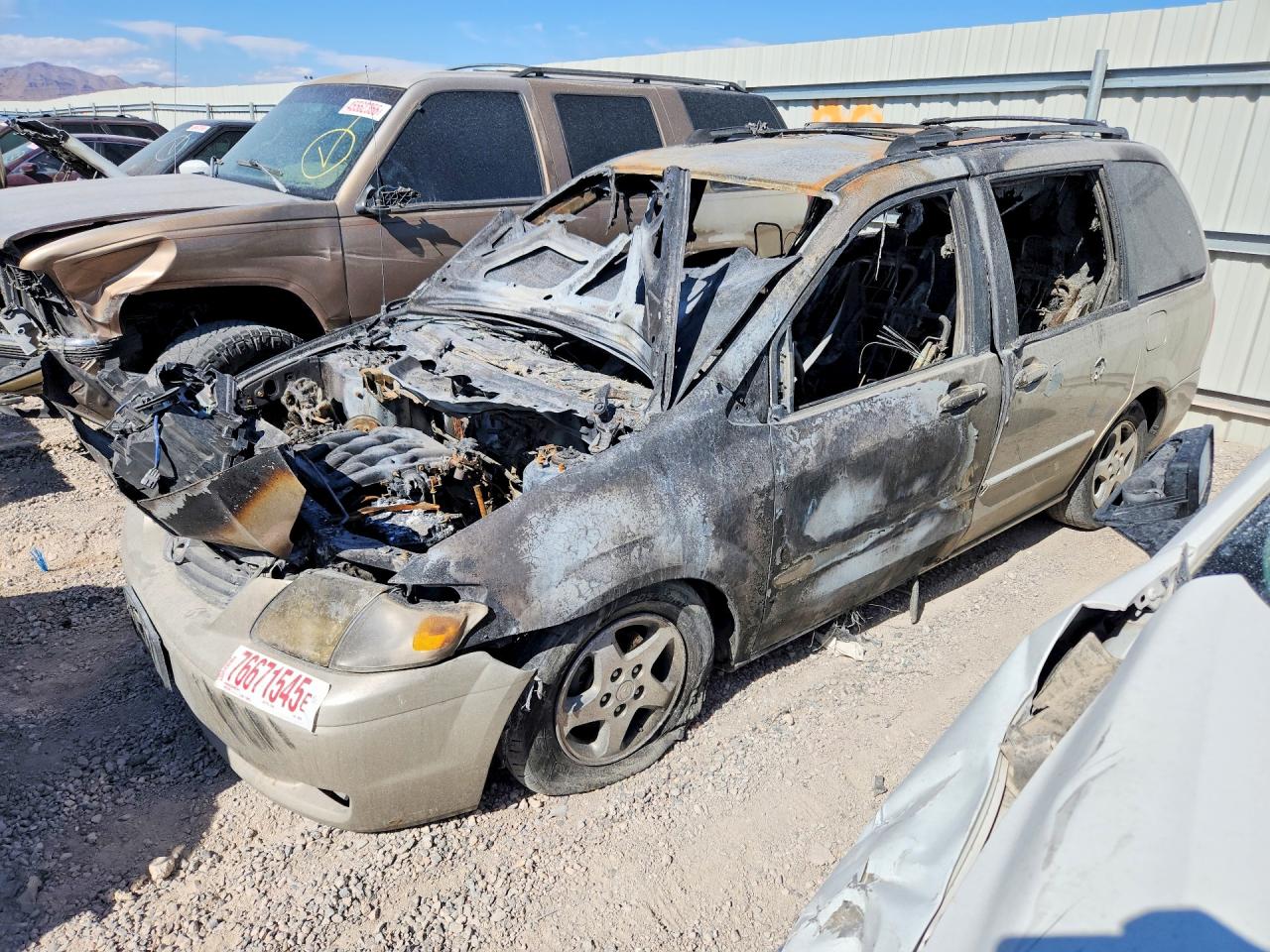 2000 Mazda MPV DX, VIN JM3LW28G4Y0153623 — Burn