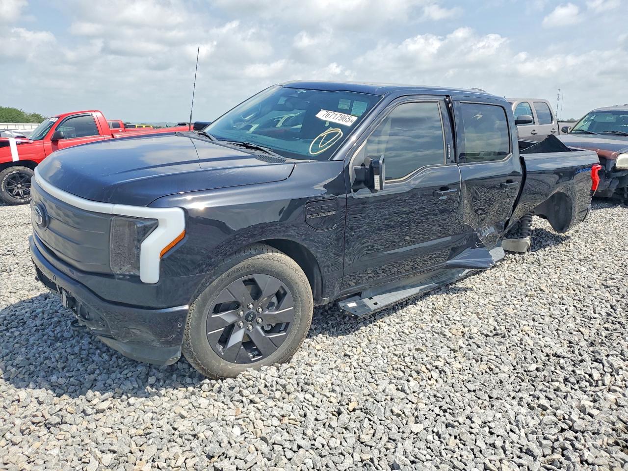 2023 Ford F-150 Lightning Lariat, VIN 1FTVW1EV2PWG09175 — Side