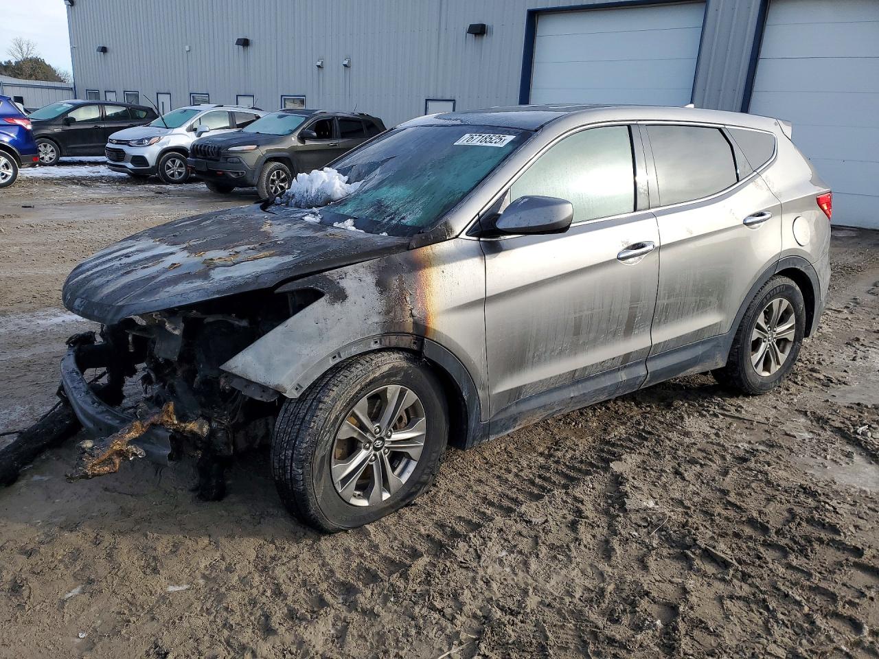 2015 Hyundai Santa Fe, VIN 5XYZTDLB6FG301328 — Engine fire