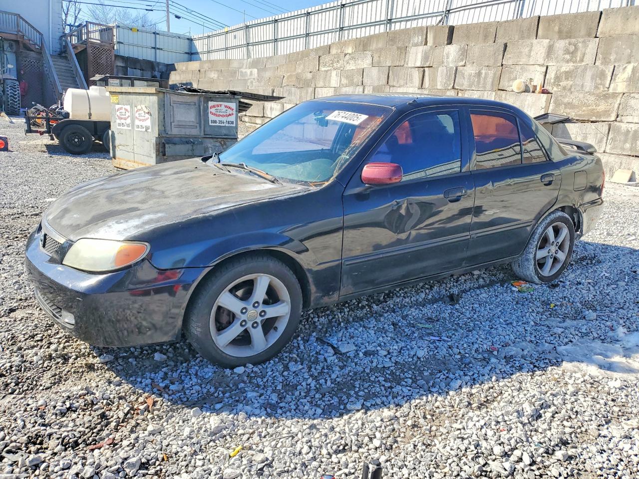 2002 Mazda Protege DX, VIN JM1BJ226X20538453 — Rear end