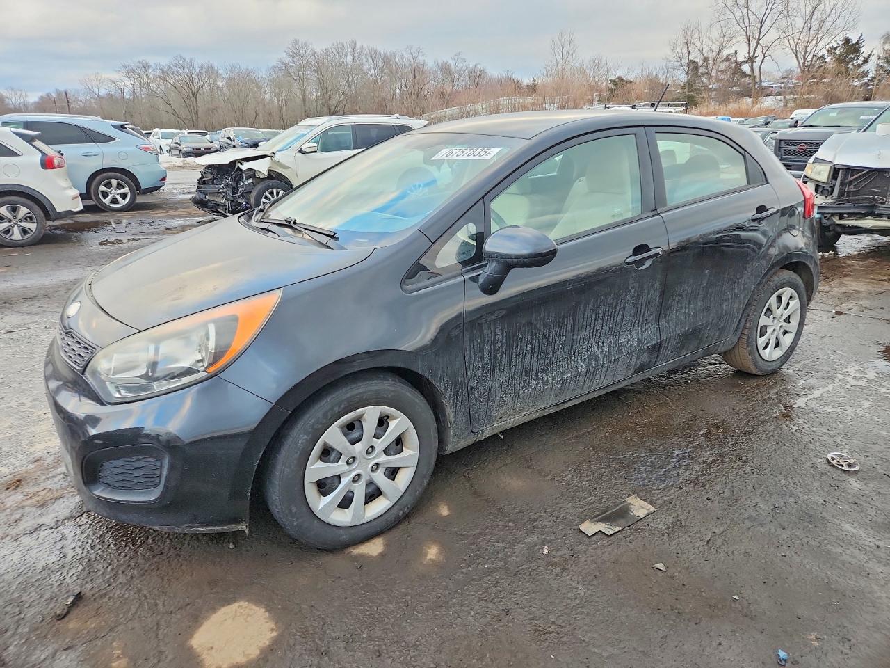 2013 Kia Rio LX, VIN KNADM5A3XD6195844 — Rear end