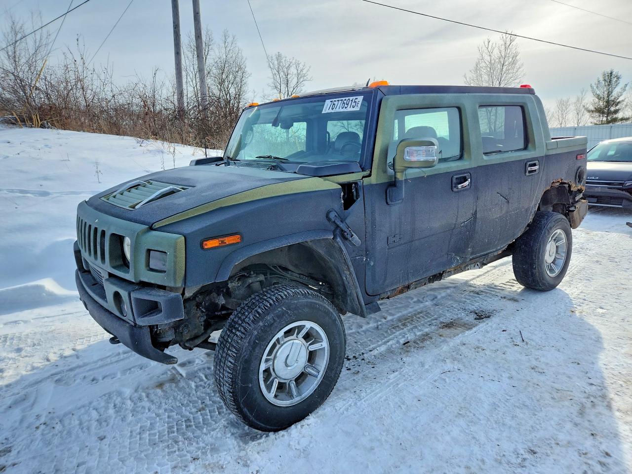 2006 Hummer H2, VIN 5GRGN22U16H114237 — Бок