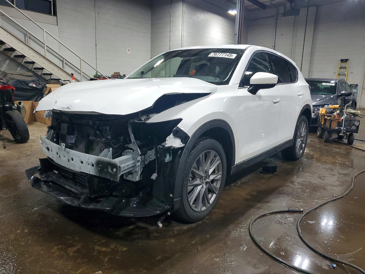 2021 Mazda CX-5 Grand Touring, VIN JM3KFBDM4M0435407 — Front end