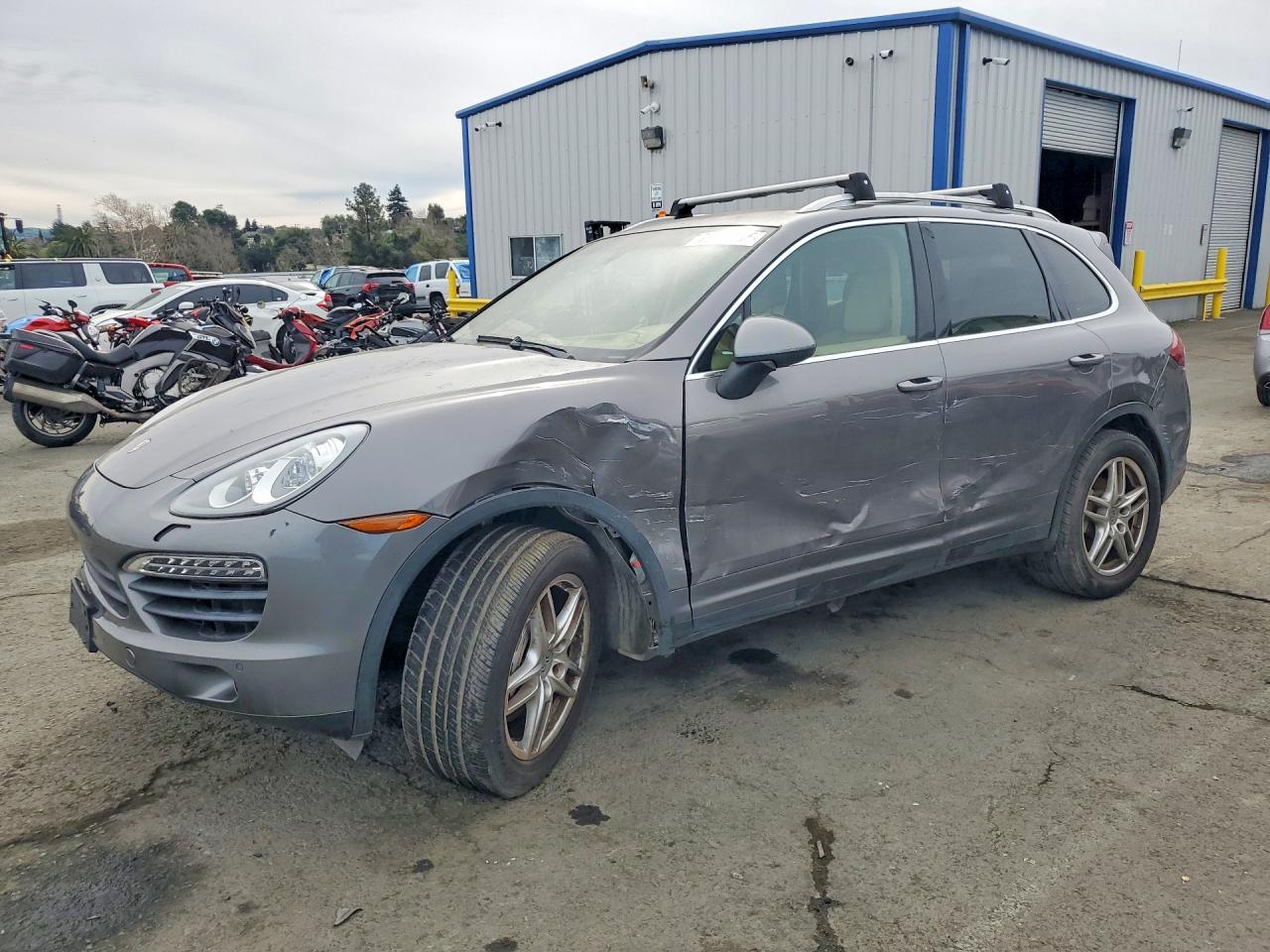 2012 Porsche Cayenne S Hybrid, VIN WP1AE2A26CLA90466 — Side