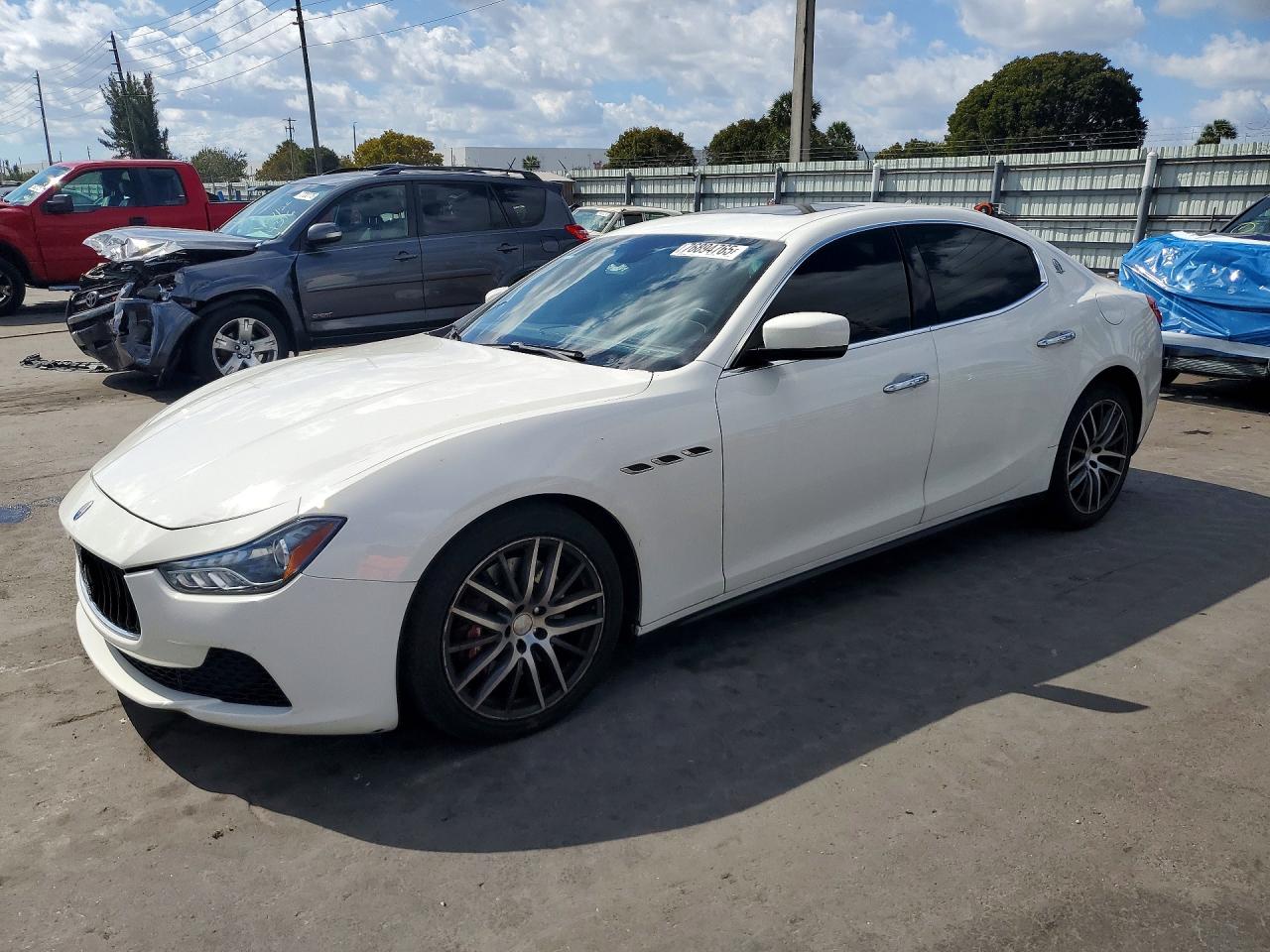 2015 Maserati Ghibli, VIN ZAM57XSA3F1139022 — Undercarriage