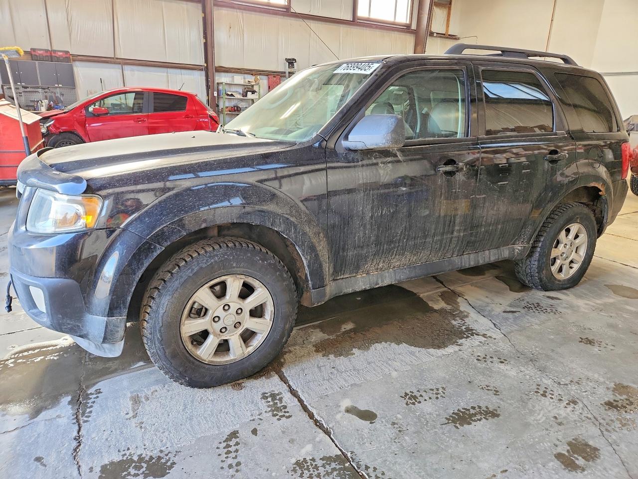 2010 Mazda Tribute Grand Touring, VIN 4F2CY9GG1AKM05223 — Зад
