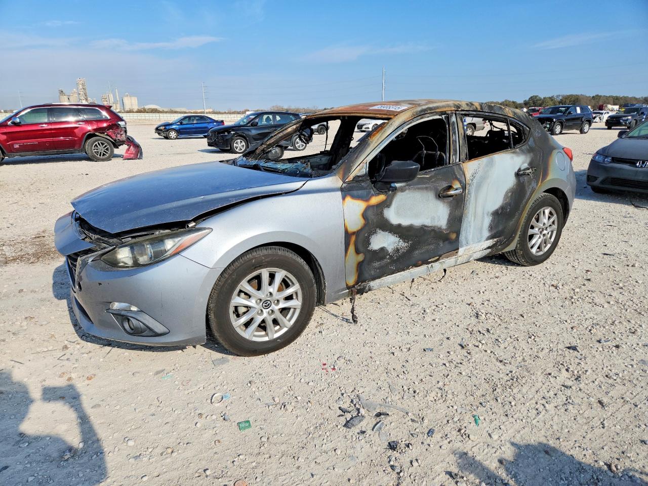 2015 Mazda 3 i Touring, VIN 3MZBM1L74FM215993 — Burn