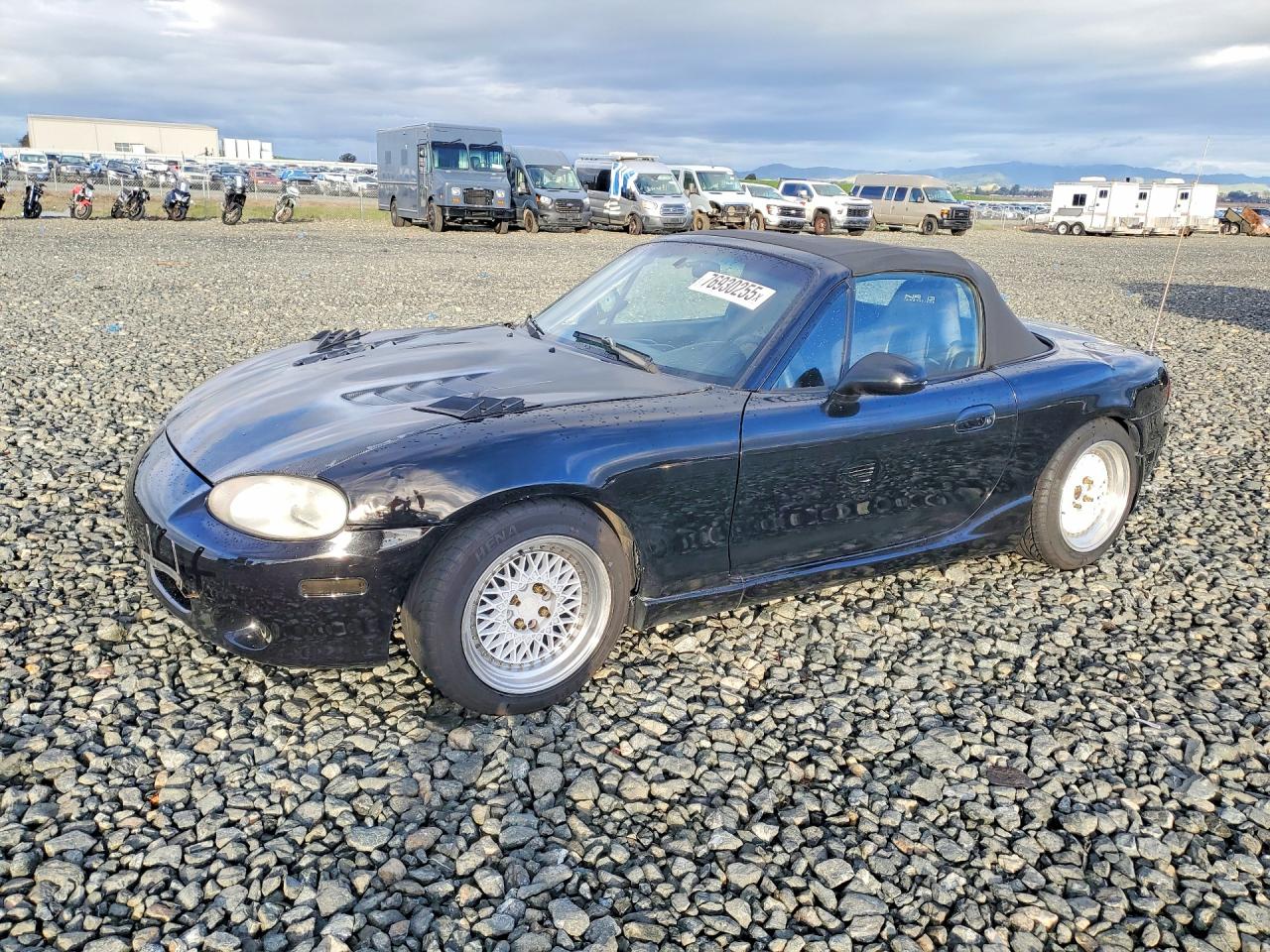 1999 Mazda MX-5 Miata, VIN JM1NB3537X0109120 — Side