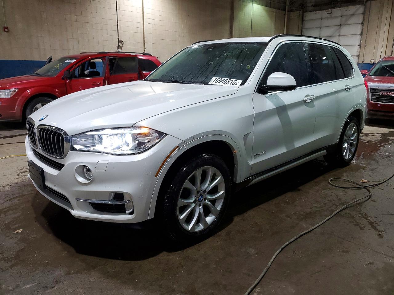 2015 BMW X5 xDrive35i, VIN 5UXKR0C56F0K66362 — Minor dents and scratches