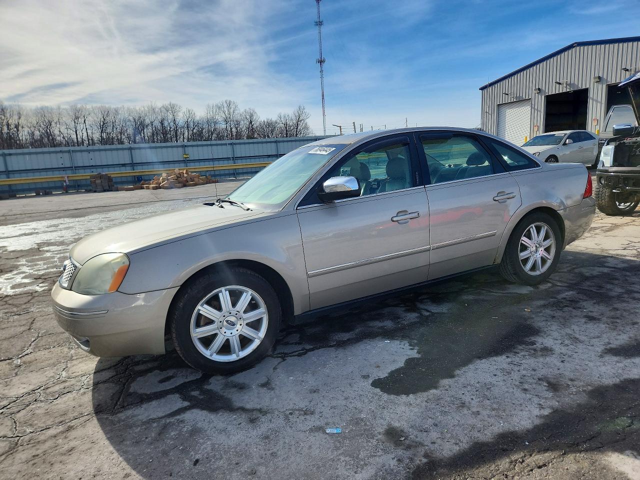 2005 Ford Five Hundred Limited, VIN 1FAFP25195G174852 — Engine fire