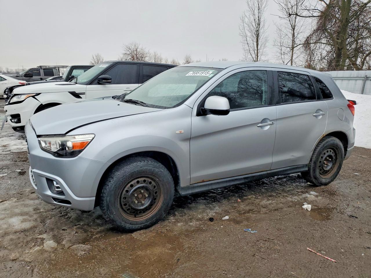 2011 Mitsubishi Outlander Sport ES, VIN JA4AH3AU1BZ607081 — Front end