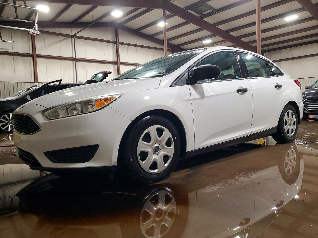 2016 Ford Focus S, VIN 1FADP3E22GL354514 — Side