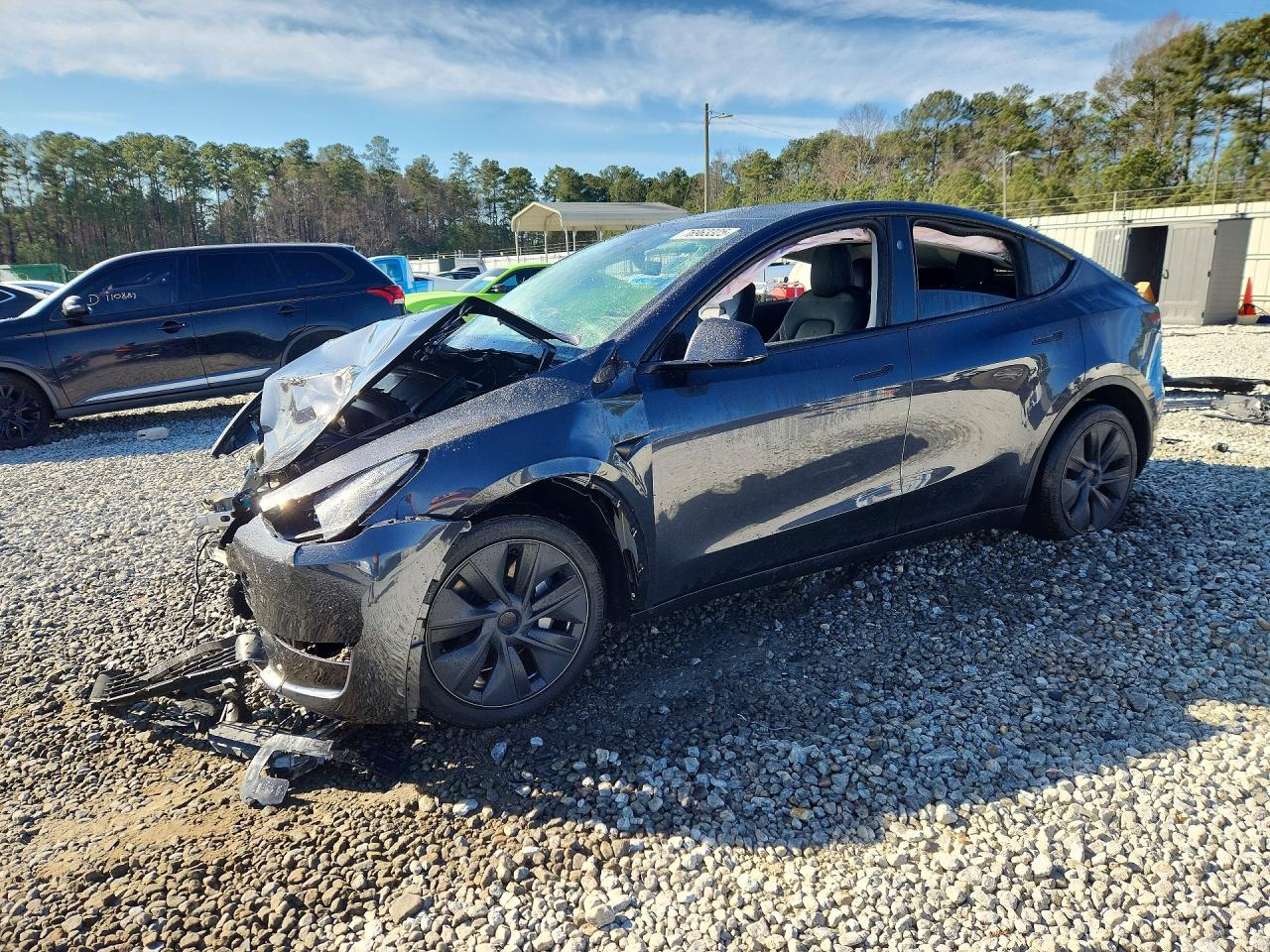2024 Tesla Model Y Long Range, VIN 7SAYGAEE6RF165156 — Front end