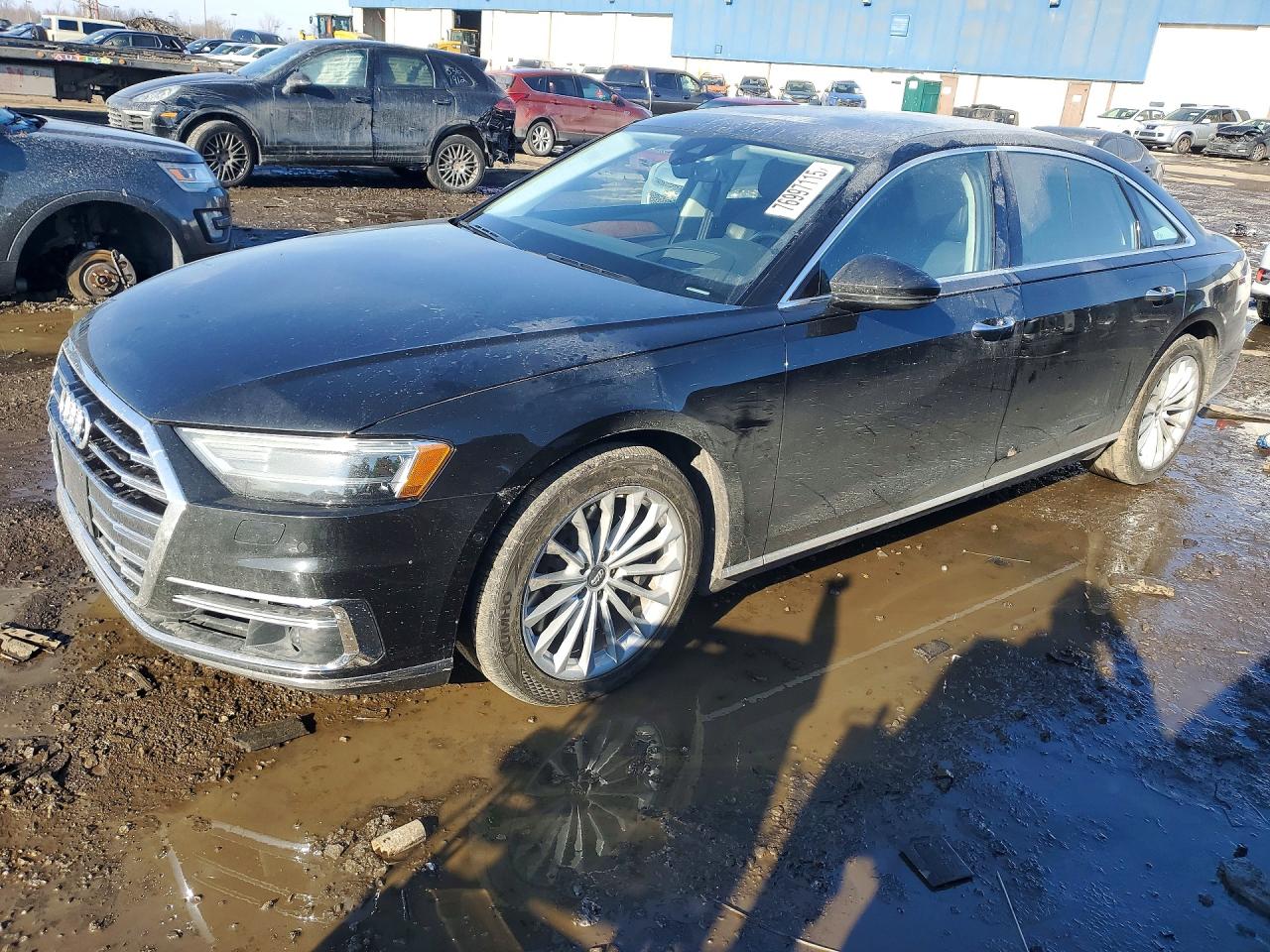 2020 Audi A8, VIN WAU8EAF85LN004282 — Side