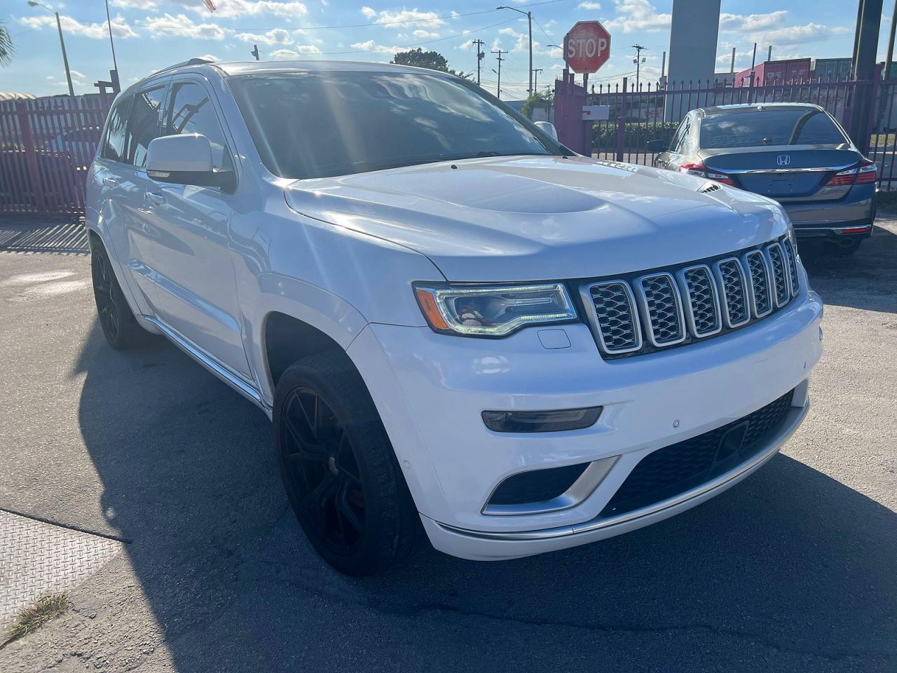 2017 Jeep Grand Cherokee Summit, VIN 1C4RJFJG1HC658598 — Ранее повреждён