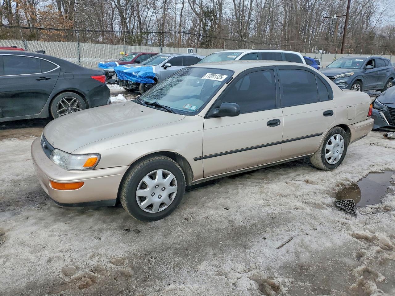 1995 Toyota Corolla DX, VIN 2T1AE09B4SC111458 — Side