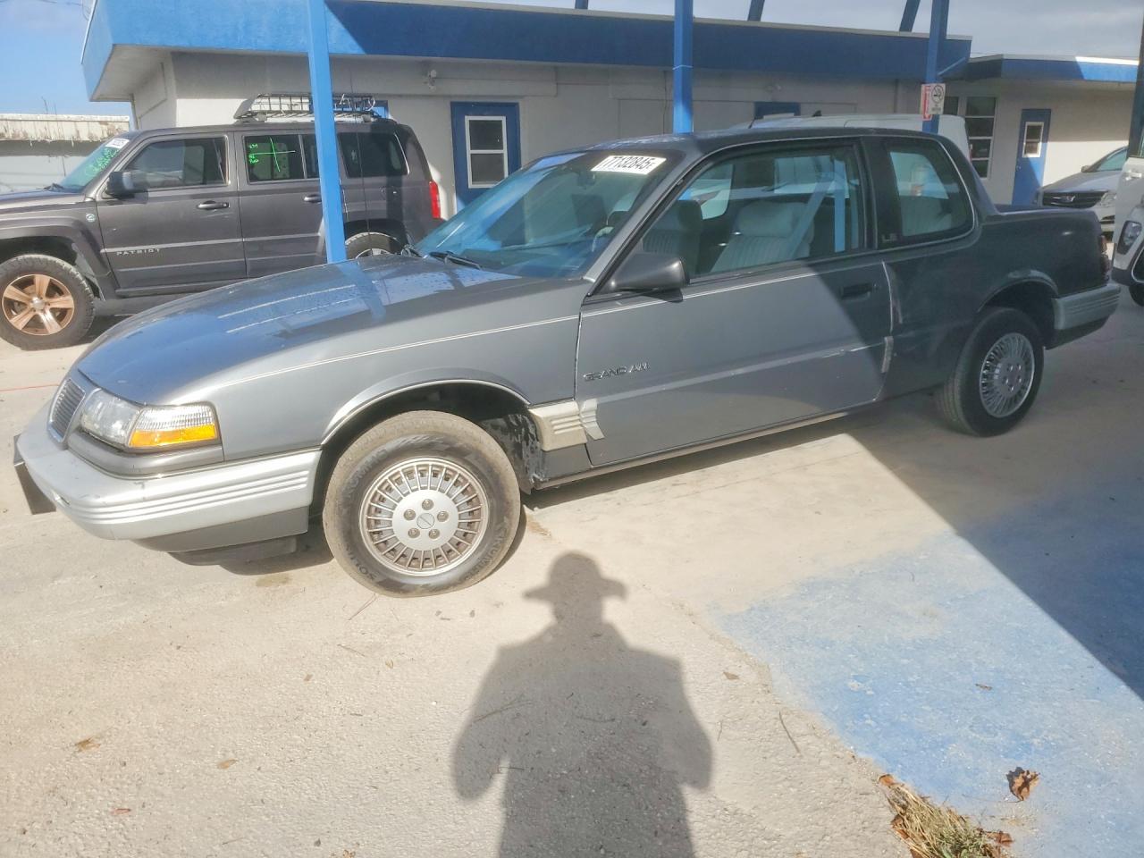 1989 Pontiac Grand Am, VIN 1G2NE14U3KC813798 — Side