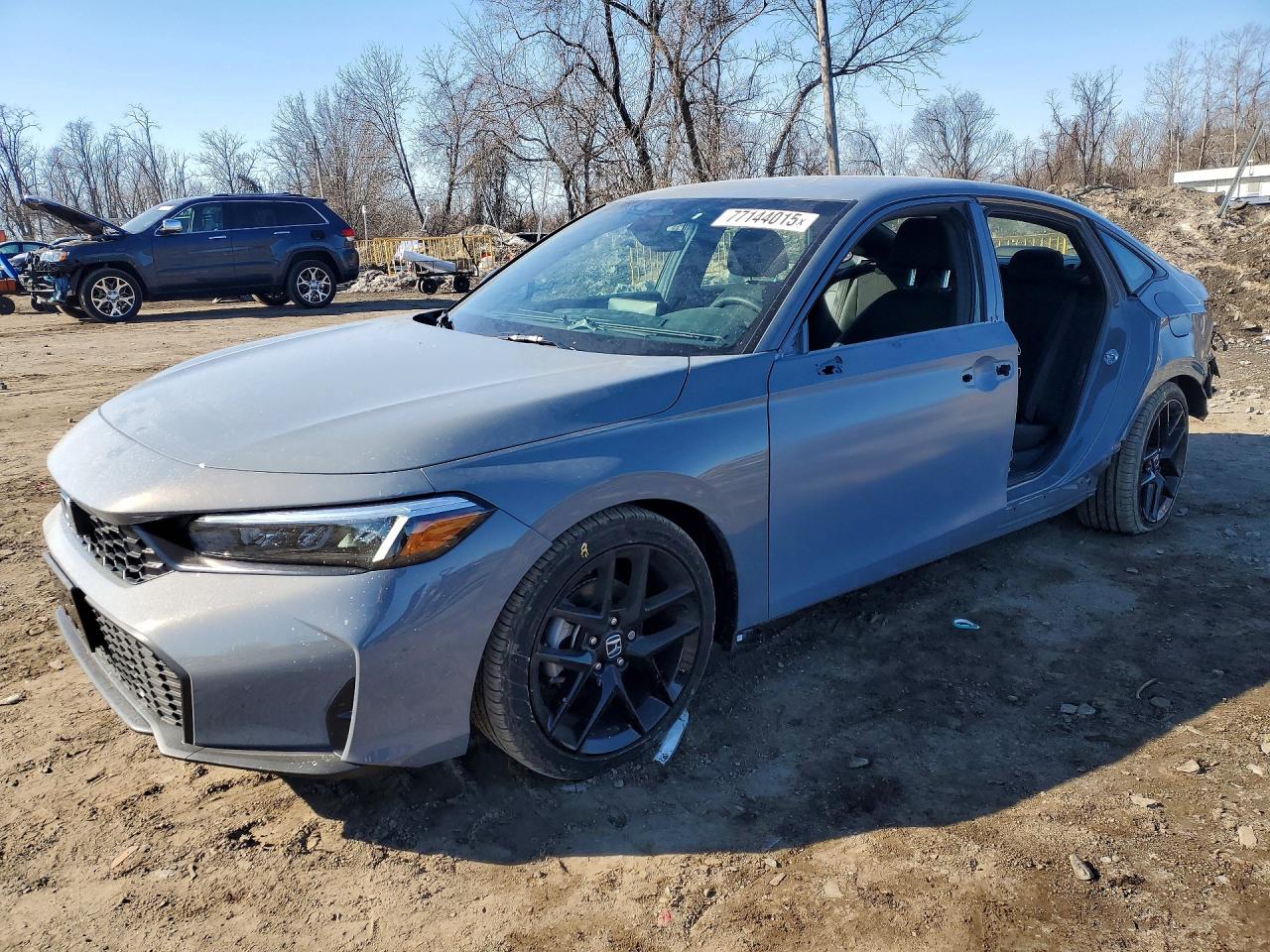 2026 Honda Civic Sport, VIN 2HGFE2F54TH529009 — Side