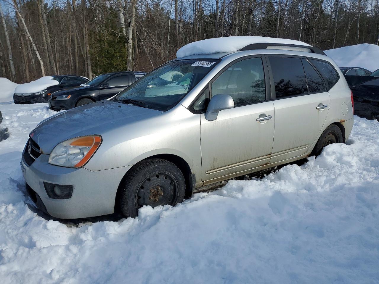 2010 Kia Rondo, VIN KNAHH8A82A7317959 — Side