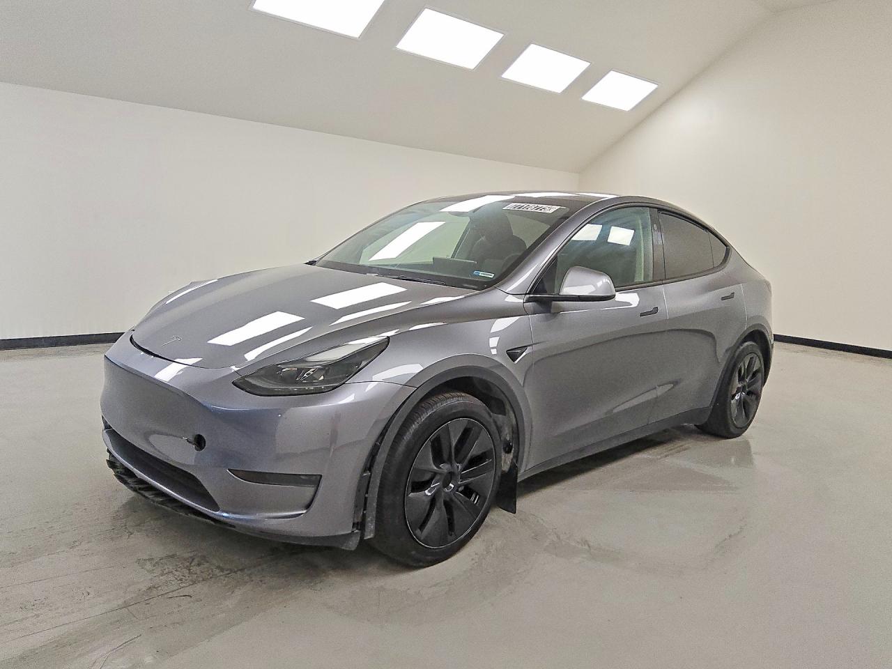 2024 Tesla Model Y, VIN 7SAYGDED4RF200253 — Front end