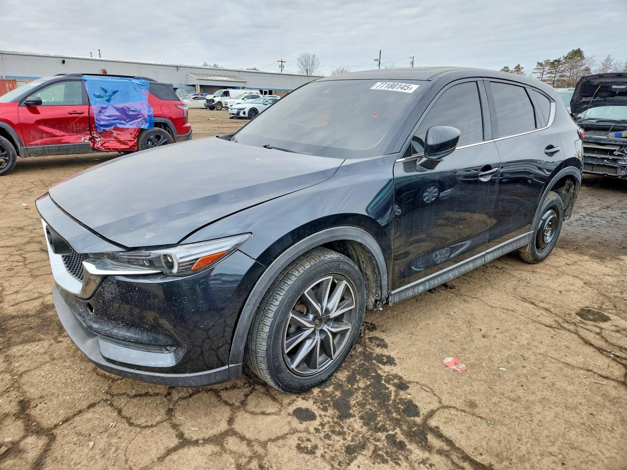 2017 Mazda CX-5 Grand Touring, VIN JM3KFBDL9H0187149 — Rear end