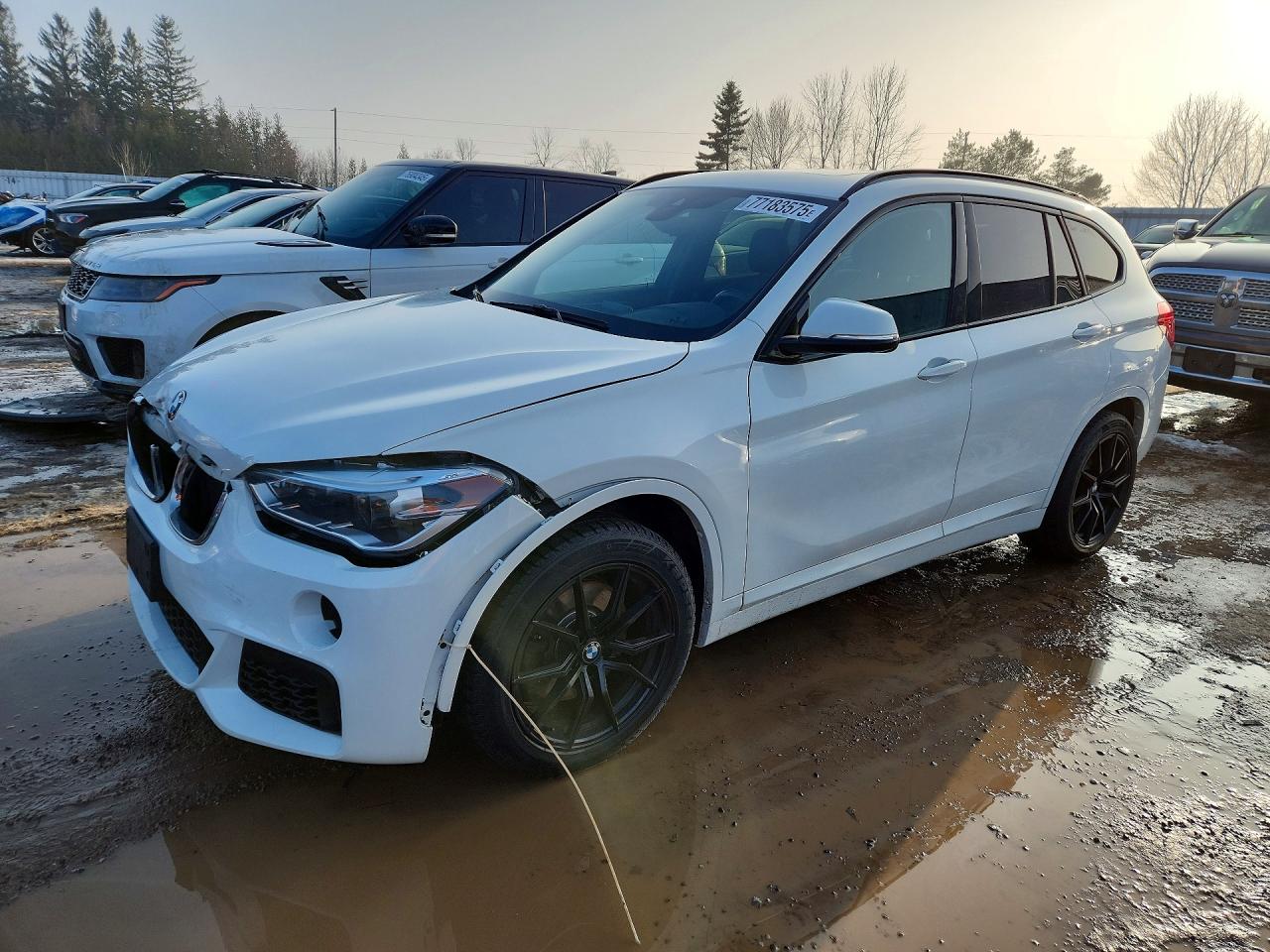 2018 BMW X1 xDrive28i, VIN WBXHT3C37J3F03838 — Front end