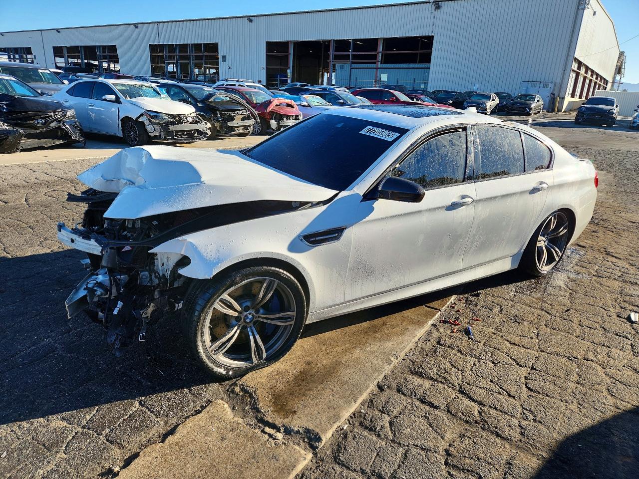 2014 BMW M5, VIN WBSFV9C5XED097417 — Перед