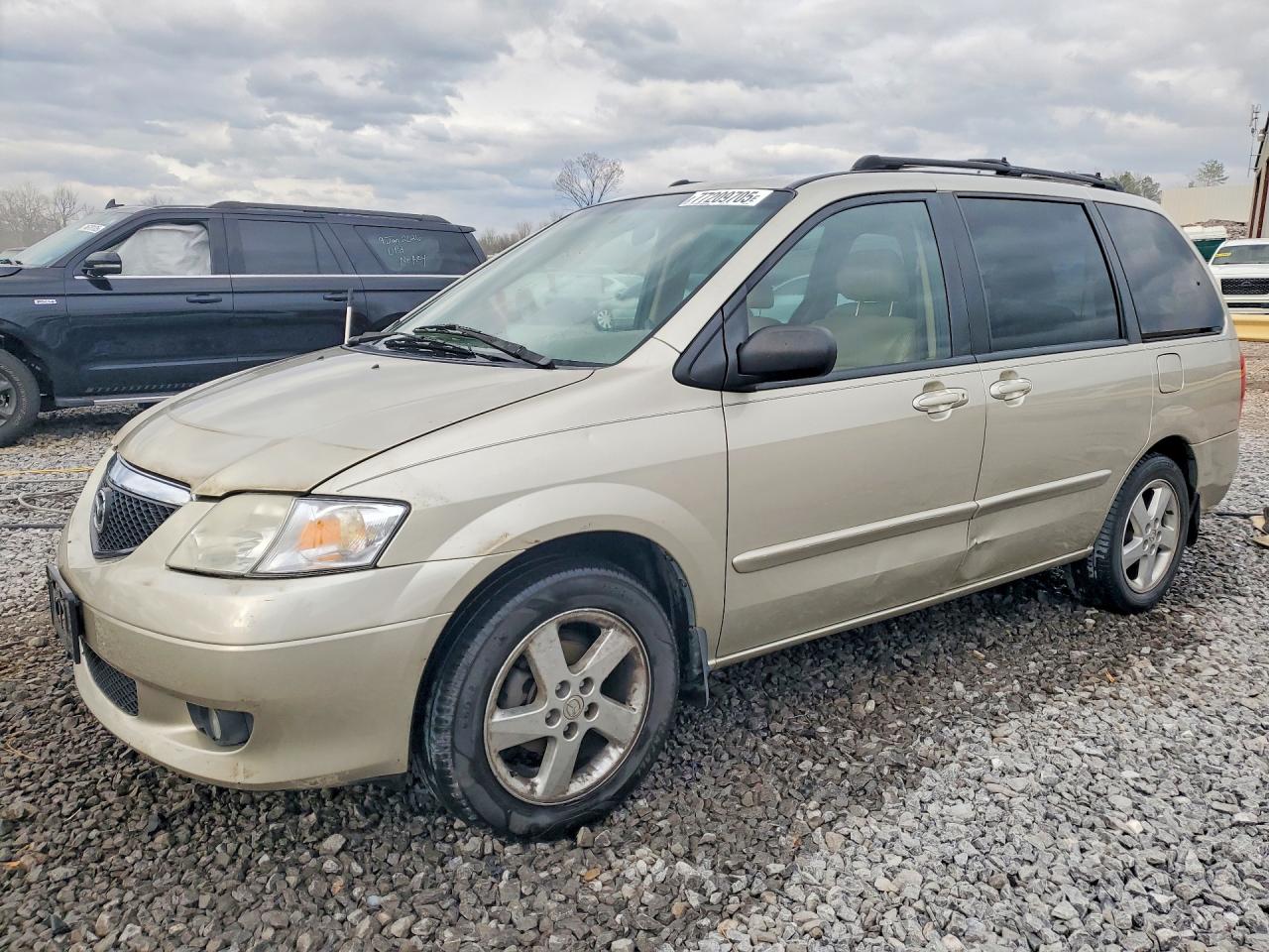 2002 Mazda MPV LX, VIN JM3LW28J520301877 — Side