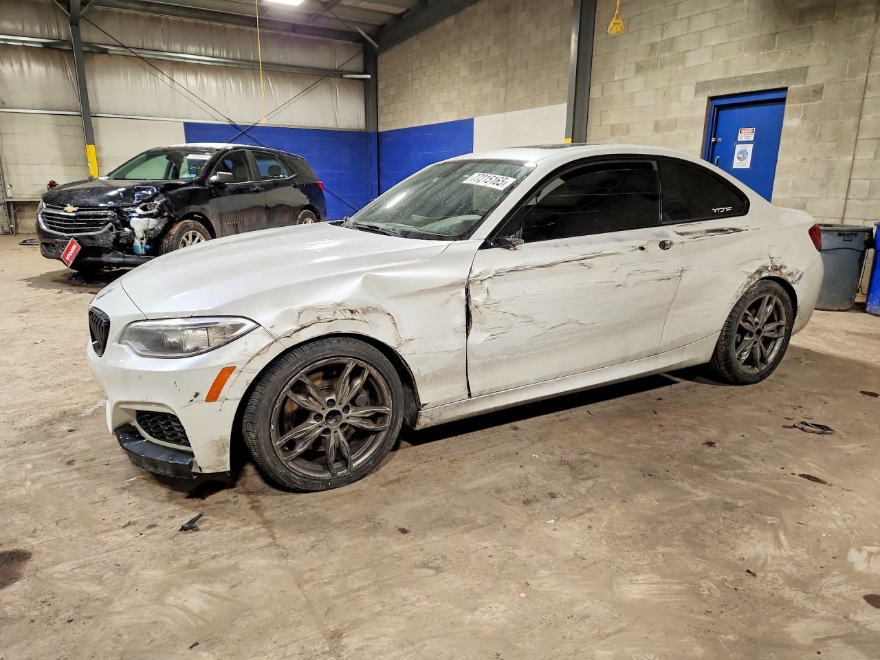 2015 BMW 2 Series M235i, VIN WBA1J7C59FV253666 — Side