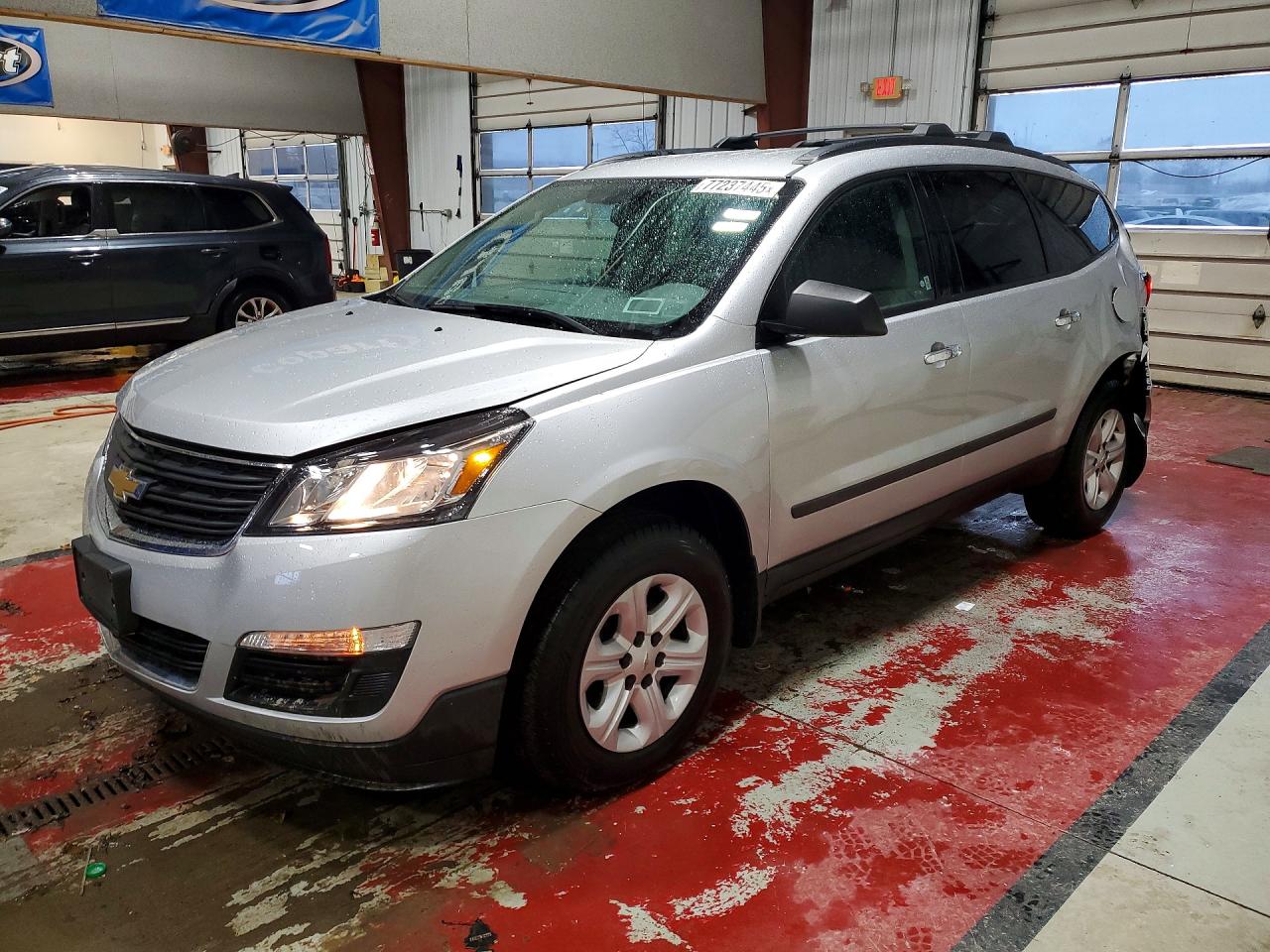 2017 Chevrolet Traverse LS, VIN 1GNKVFED4HJ347871 — Rear end