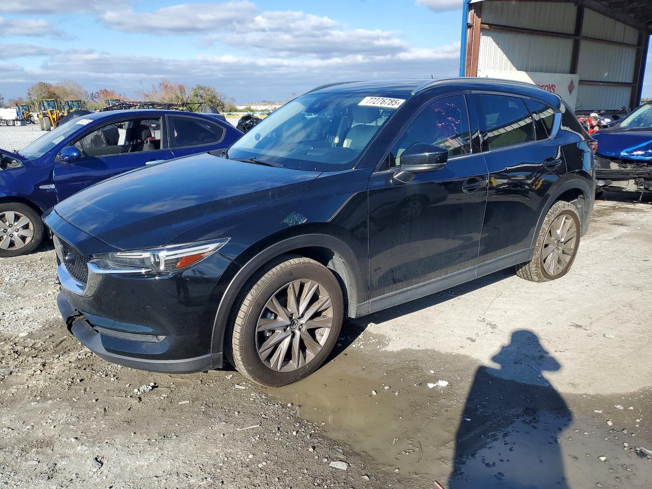 2020 Mazda CX-5 Grand Touring, VIN JM3KFBDMXL0758794 — Front end