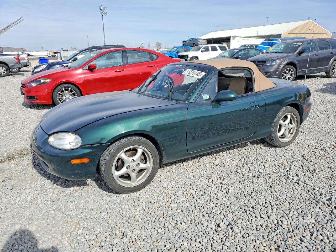 1999 Mazda MX-5 Miata, VIN JM1NB3536X0121792 — Side
