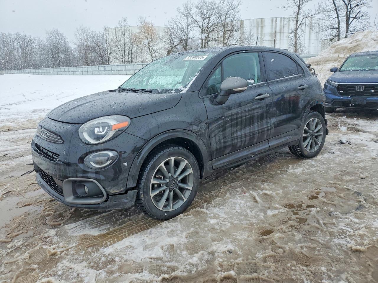 2023 FIAT 500X Sport, VIN ZFBNF3B14PP988450 — Зад
