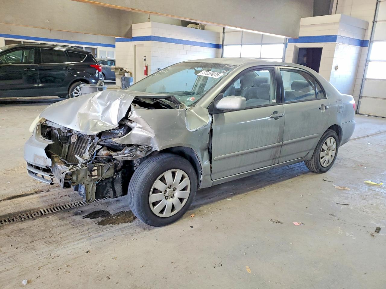 2003 Toyota Corolla LE, VIN 1NXBR32E03Z054741 — Front end