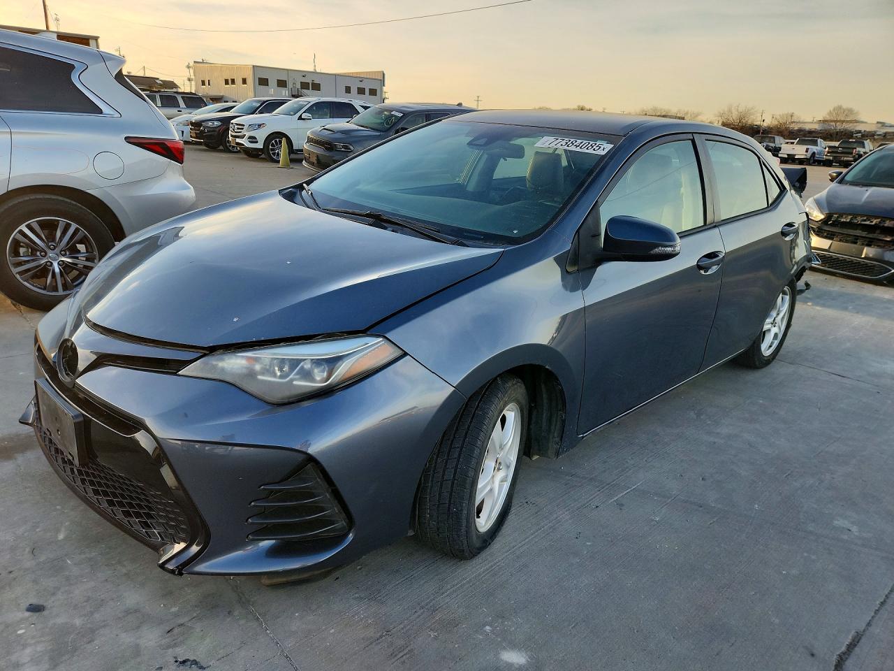 2018 Toyota Corolla LE, VIN 5YFBURHE7JP855691 — Rear end