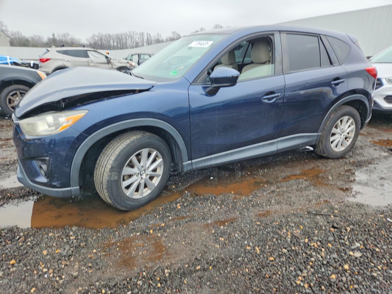 2014 Mazda CX-5 Touring, VIN JM3KE2CY8E0429747 — Front end