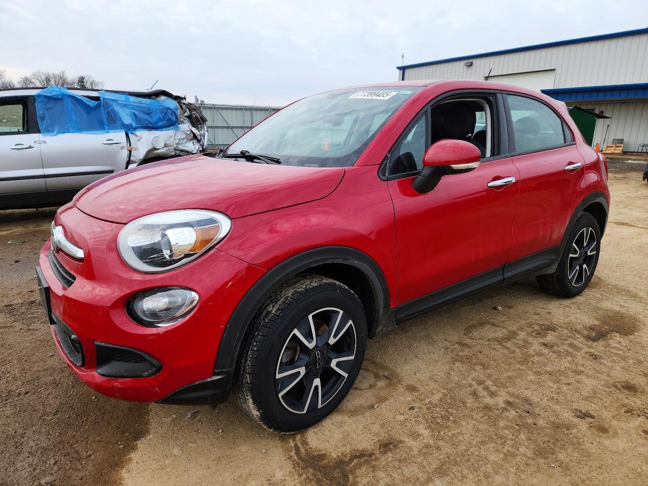 2017 FIAT 500X Pop, VIN ZFBCFYAB6HP535396 — Бок